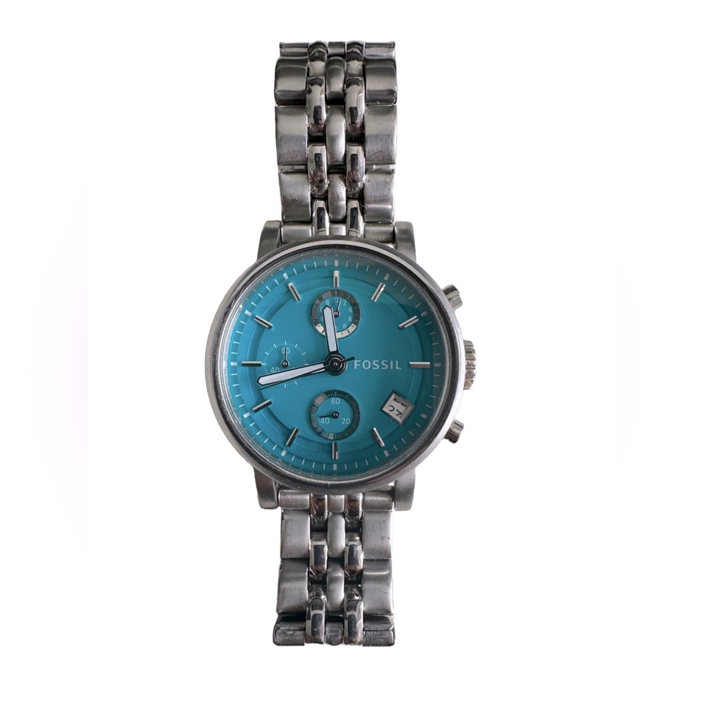 Women’s Fossil watch with beautiful Cyan colored dial with brand new battery .
